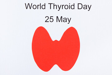 Red thyroid shape and inscription World Thyroid Day 25 May. Problems with thyroid