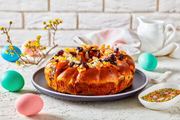 easter bread wreath sprinkled with fruits and nuts