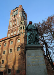 Copernicus statue and The Old Town Hall, Torun, Poland
