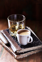 Cup of coffee dark wooden background. Close up. 