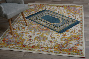 Prayer rug, small carpet used by Muslims to pray.