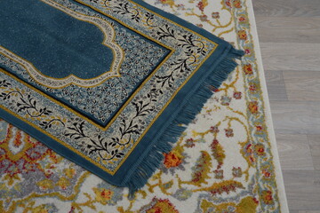 Prayer rug, small carpet used by Muslims to pray.