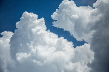 Naklejka na ściany i meble Cloudscape. Blue sky and white cloud. Sunny day. Cumulus cloud.