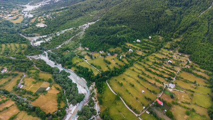 Mountain landscape with houses and farms in Theth in the Albanian alps