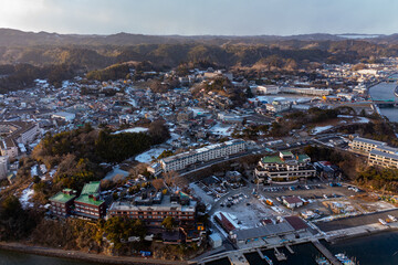 Naklejka premium Matsushima Town, Miyagi, Japan. Town Covered in Snow in Winter, Aerial Point of View