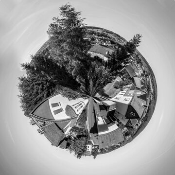 small planet perspective of rural village of Brandoberndorf near Usingen
