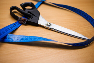 professional seamstresses, scissors, centimeter, buttons, fabric. High quality photo