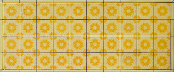 Yellow flowered Peranakan tiles