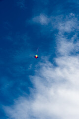 Fototapeta premium Colorful Kites flying over the sky
