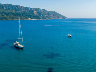 Plakat boats in Agios Georgios beach in north corfu island greece