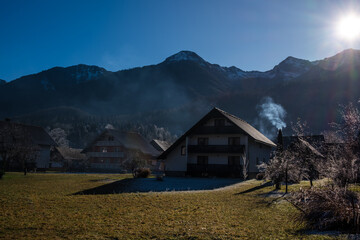 Fototapeta na wymiar Winter morning in the village mountains