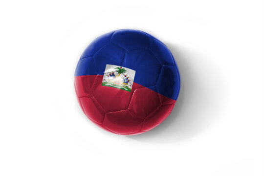 realistic football ball with colorfull national flag of haiti on the white background.