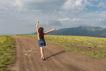 girl on a mountain road