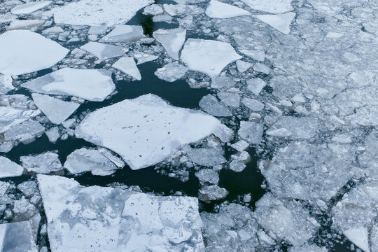 Ice floes on the water surface. Winter.