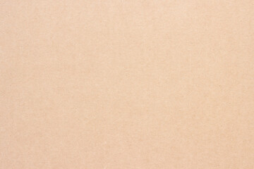 A sheet of brown cardboard. Paper natural texture.