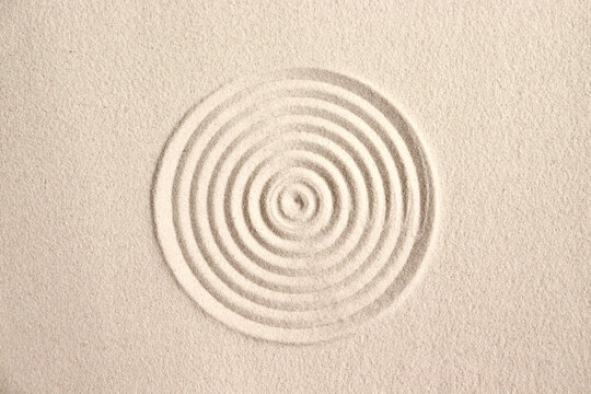 A circle in the sand. Zen Japanese garden. Background.