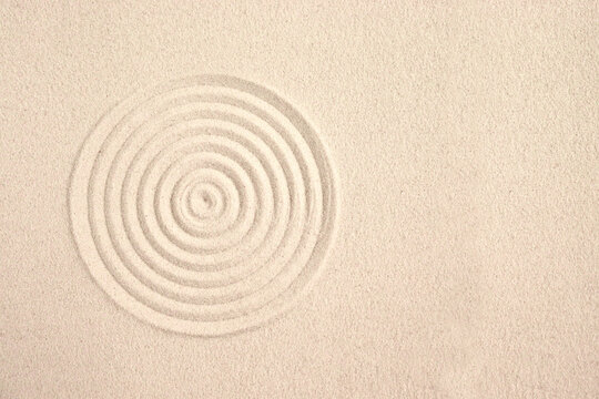 A circle in the sand. Zen Japanese garden. Background.