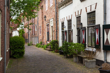 Fototapeta na wymiar Street in the old medieval center of the Dutch medium-sized historic city of Amersfoort.