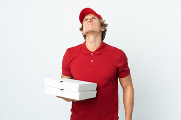 pizza delivery man over isolated white background and looking up