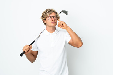 English man playing golf having doubts and thinking
