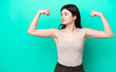 Young Russian woman isolated on green background doing strong gesture