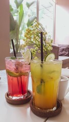 Glass of lemonade and strawberry, an afternoon at the cafe with two drinks