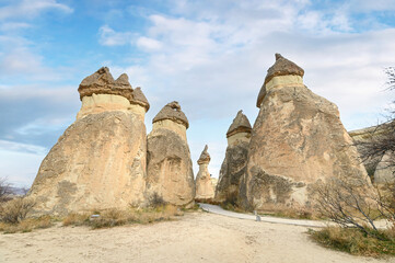 Fototapeta premium Fairy chimneys rock formations near Goreme, Cappadocia, Turkey.