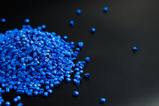 blue granules of polypropylene, polyamide. Background. Plastic and polymer industry. Microplastic products.