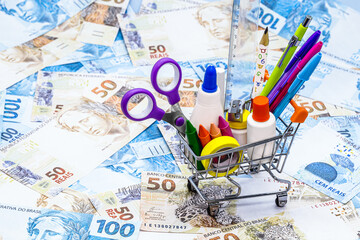 School supplies with shopping cart, pencil, pen, ruler, eraser and scissors, with money background, school supplies promotion concept