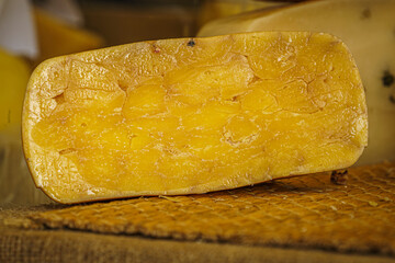 Head of cheese on a wooden table