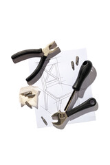 Furniture hand industrial tools and chair assembly drawing isolated on white background, close up, flat lay