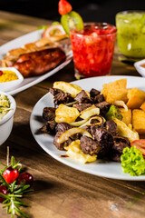 Colorful Food Appetizer Starts Snacks Fresh Delicious Menu Recipe Meal Meat Chicken Fries Fish Seafood Beer on a wooden table