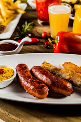 Colorful Food Appetizer Starts Snacks Fresh Delicious Menu Recipe Meal Meat Chicken Fries Fish Seafood Beer on a wooden table