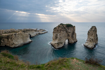 Fototapeta premium Rouche rocks in Beirut, Lebanon in the sea during daytime
