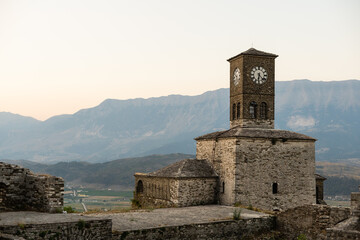 Fototapeta premium Historical UNESCO protected town of Gjirocaster with a castle on the top of the hill, Southern Albania. Panoramic photo