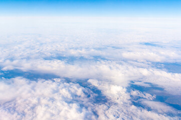 Beautiful sky above the clouds. View from the airplane window, cockpit.