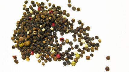 fragrant mixture of black, red peppercorns on a white background
