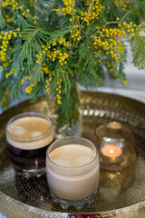 Obraz na płótnie Canvas coffee, mimosa and candle