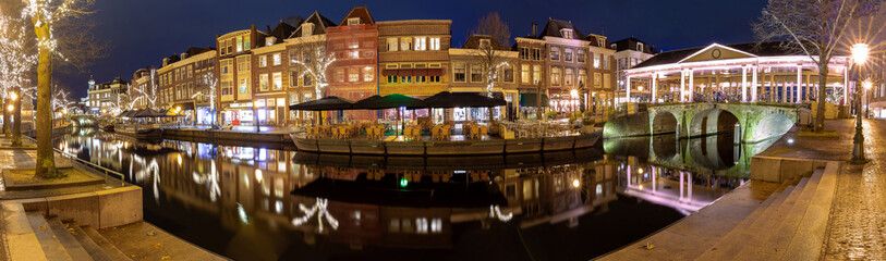 Panorama of the city embankment in Leiden at dawn.