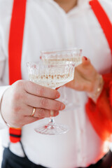 A beautiful champagne glass in the sun. New Year and the concept of the holiday