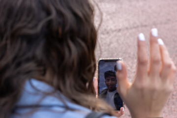 close up of latin man talking on video call with his partner. distance relationship