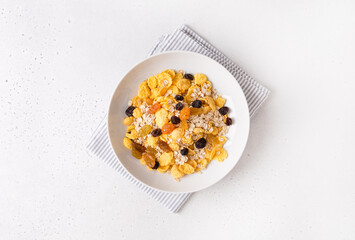 Healthy breakfast, diet culture. Fresh granola, muesli with raisins. Copy space