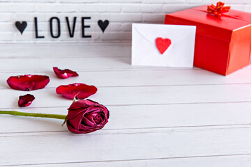 Valentine's day concept, rose, gift and love letter.