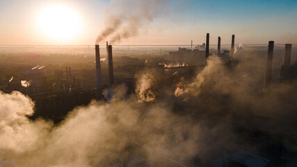 Fototapeta premium factory smoke from chimneys from a height panorama