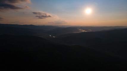 Mountains forest at sunset top view