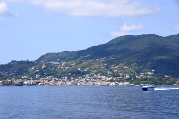 view to Ischia Ponte village and the coastline from the boat