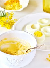 the process of cooking stuffed eggs 
