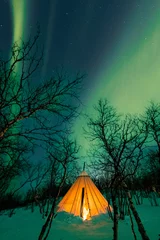 Foto auf Glas Northern Lights, aurora borealis over Abisko, Swedish Lapland. © ronnybas