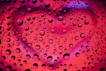 Heart for drops of water. Blurred background.