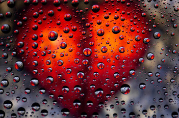 Heart for drops of water. Blurred background.